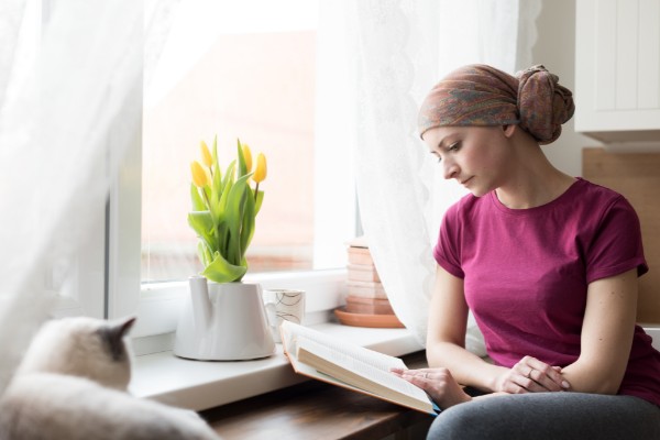 cancer woman reading book